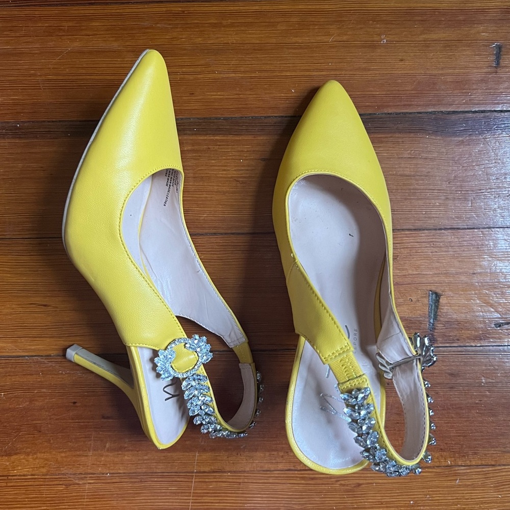Nanette Lapore yellow slingback pumps with jewel embellishments